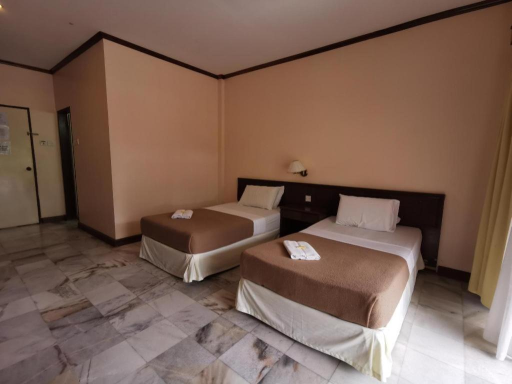 Oyo 89972 Borneo Paradise Beach Hotel โกตาคินาบาลู ภายนอก รูปภาพ